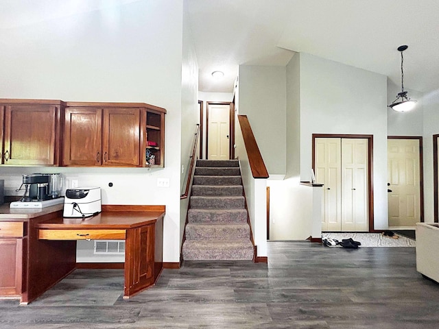 12383 Midway Cir NE, Blaine, MN 55449 - stairway featuring wood finished floors and baseboards