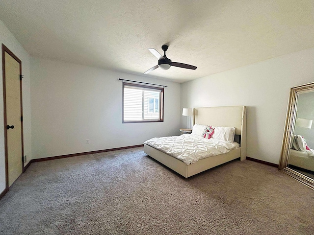 12383 Midway Cir NE, Blaine, MN 55449 - bedroom featuring carpet flooring, ceiling fan, and a textured ceiling