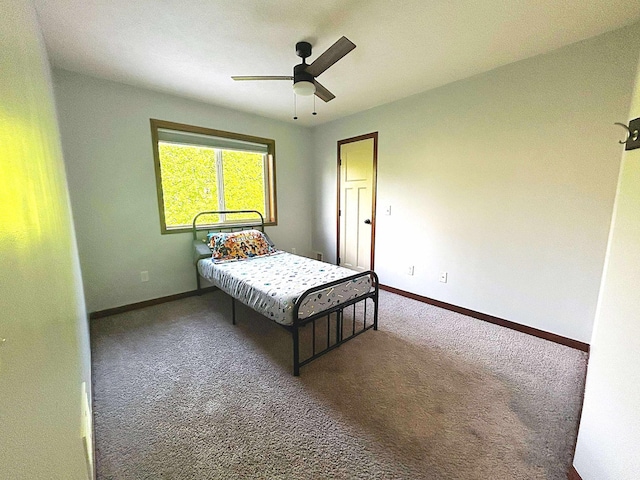 12383 Midway Cir NE, Blaine, MN 55449 - bedroom with carpet flooring and ceiling fan