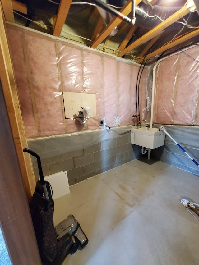 12383 Midway Cir NE, Blaine, MN 55449 - basement with a sink and concrete block wall