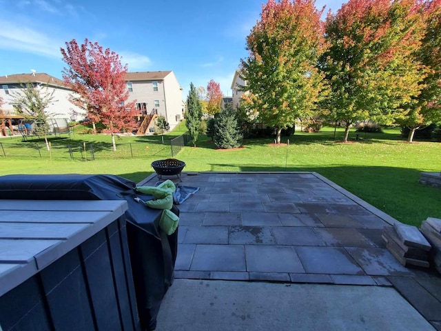 12383 Midway Cir NE, Blaine, MN 55449 - view of patio / terrace featuring an outdoor fire pit