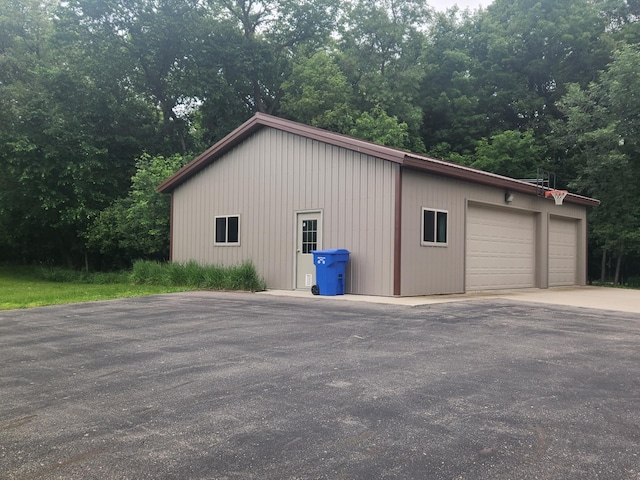 23064 Pearl Lake Rd, Lake View Twp, MN 56501 - view of property exterior with a detached garage and an outbuilding