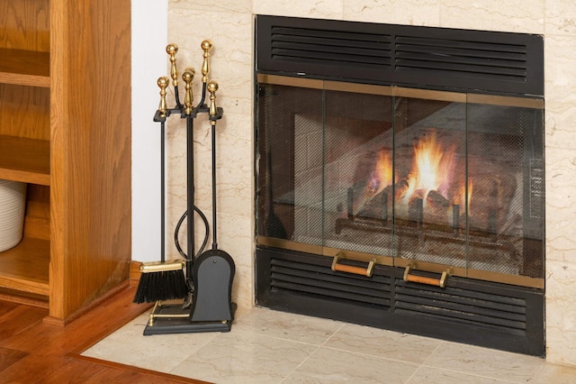 3924 Denmark Ave, Eagan, MN 55123 - detailed view of a glass covered fireplace and wood finished floors