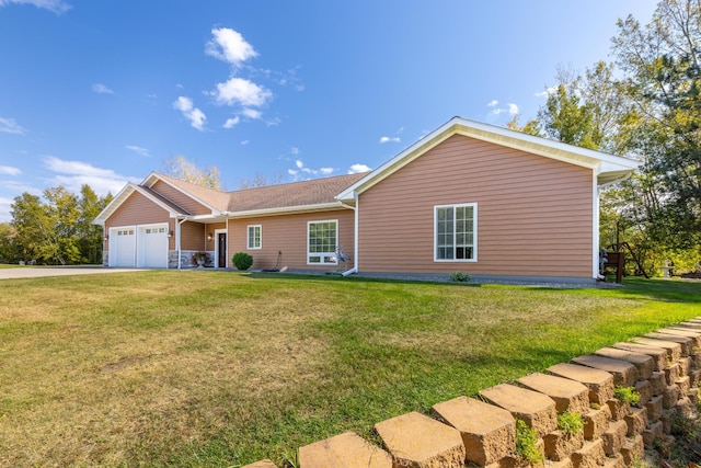 1614 8th St, Grand Rapids, MN 55744 - ranch-style home featuring an attached garage, concrete driveway, and a front lawn