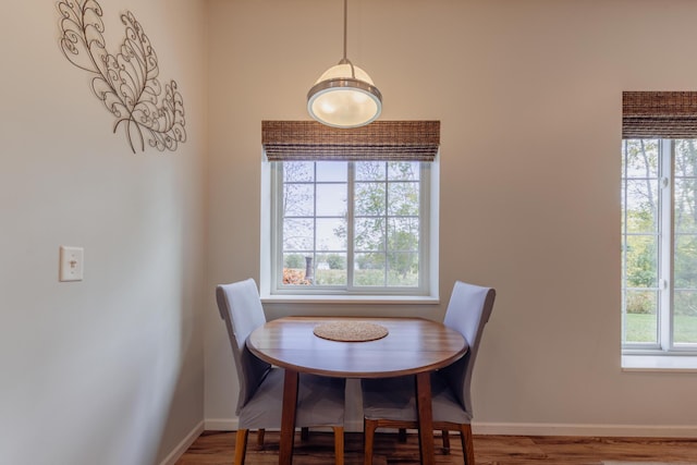 1614 8th St, Grand Rapids, MN 55744 - dining room with baseboards and wood finished floors