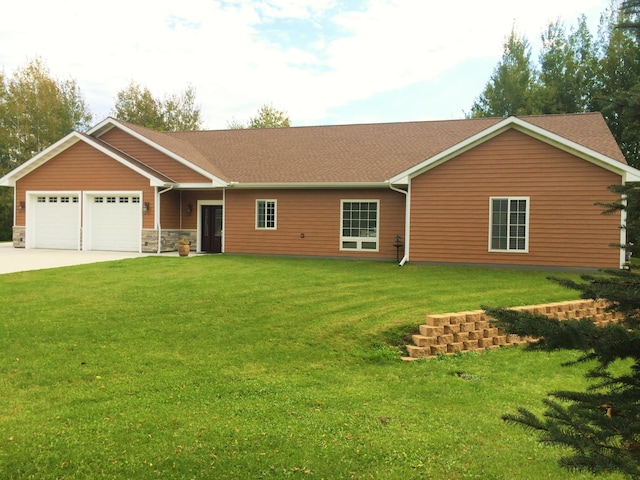 1614 8th St, Grand Rapids, MN 55744 - ranch-style home with a garage, driveway, a front lawn, and a shingled roof