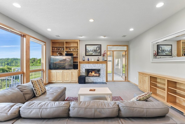 18715 24th Ave N, Plymouth, MN 55447 - carpeted living room featuring recessed lighting and a fireplace with flush hearth