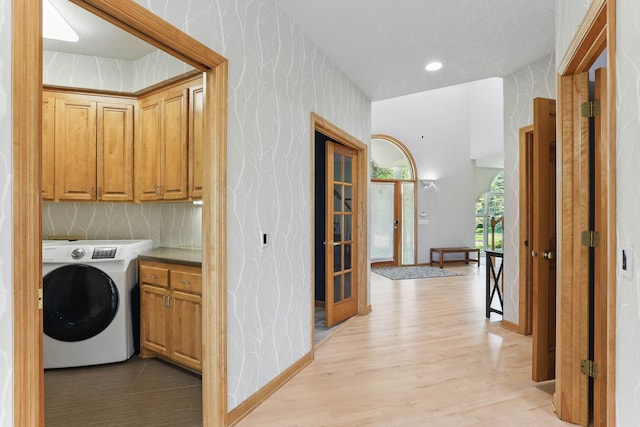 18715 24th Ave N, Plymouth, MN 55447 - laundry room featuring washer / clothes dryer, cabinet space, light wood-style flooring, recessed lighting, and baseboards