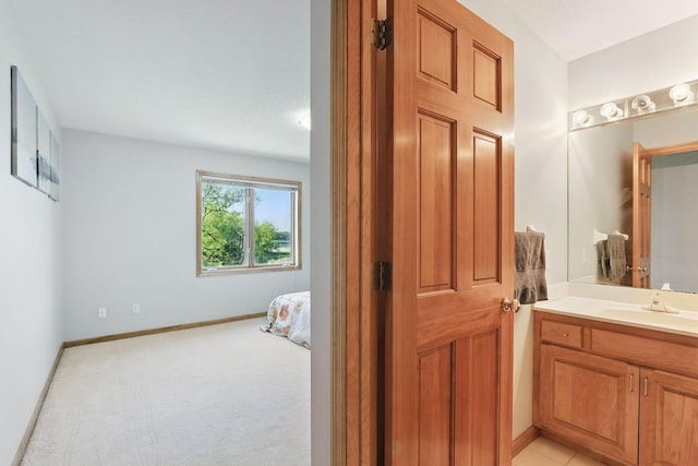 18715 24th Ave N, Plymouth, MN 55447 - bathroom with vanity and baseboards