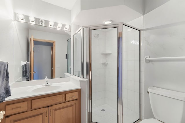 18715 24th Ave N, Plymouth, MN 55447 - bathroom with vanity, toilet, and a shower stall