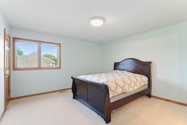 18715 24th Ave N, Plymouth, MN 55447 - bedroom featuring light carpet and baseboards