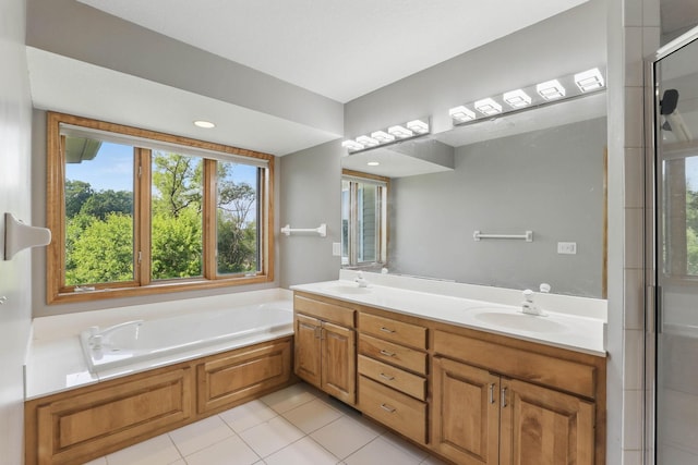 18715 24th Ave N, Plymouth, MN 55447 - full bath with double vanity, a garden tub, tile patterned flooring, and an enclosed shower