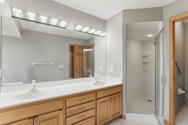 18715 24th Ave N, Plymouth, MN 55447 - bathroom featuring double vanity, a shower stall, and tile patterned floors