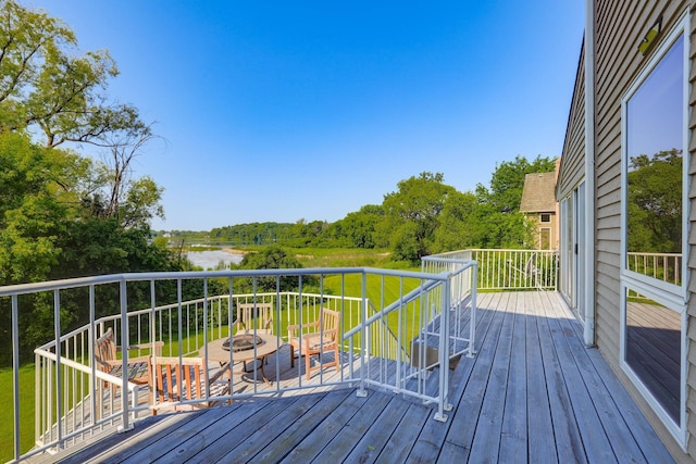 18715 24th Ave N, Plymouth, MN 55447 - wooden deck featuring a fire pit