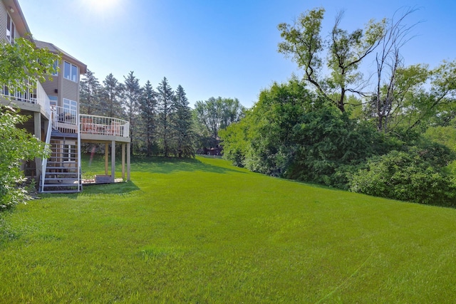 18715 24th Ave N, Plymouth, MN 55447 - view of grassy yard with stairway and a deck