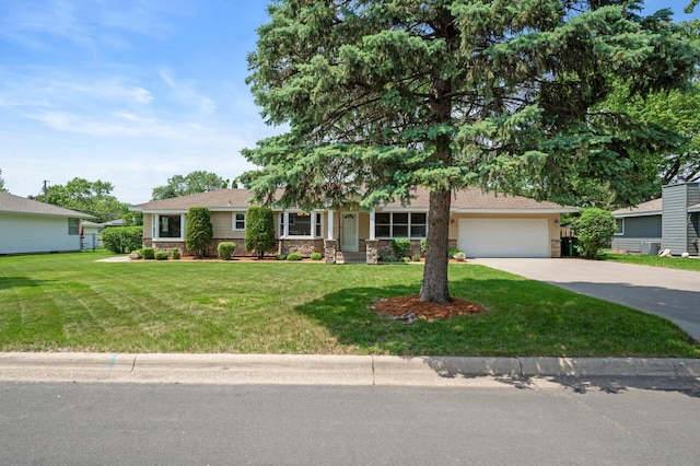 9452 Stevens Ave S, Bloomington, MN 55420 - view of front of property with stone siding, driveway, a garage, and a front lawn
