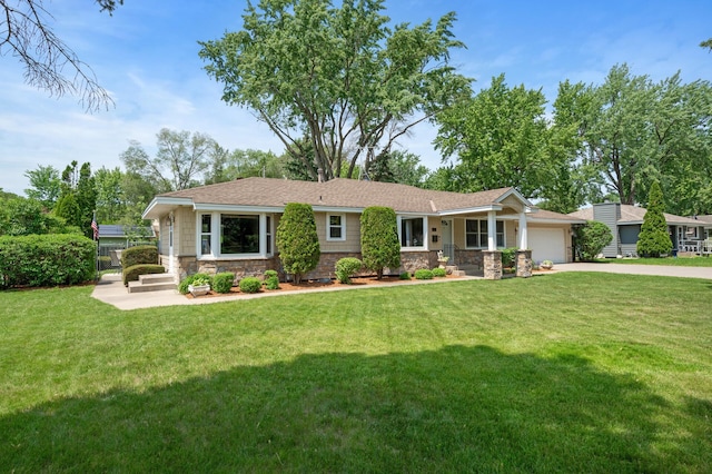 9452 Stevens Ave S, Bloomington, MN 55420 - ranch-style home featuring a garage, concrete driveway, a front yard, and stone siding
