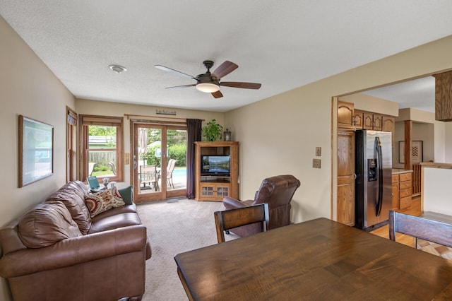9452 Stevens Ave S, Bloomington, MN 55420 - living area with ceiling fan and light carpet