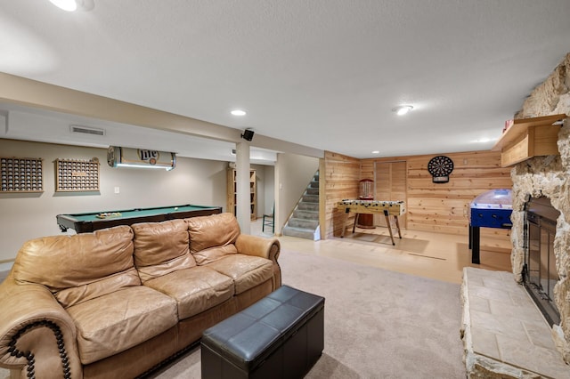 9452 Stevens Ave S, Bloomington, MN 55420 - living area featuring a stone fireplace, pool table, stairs, carpet flooring, and recessed lighting