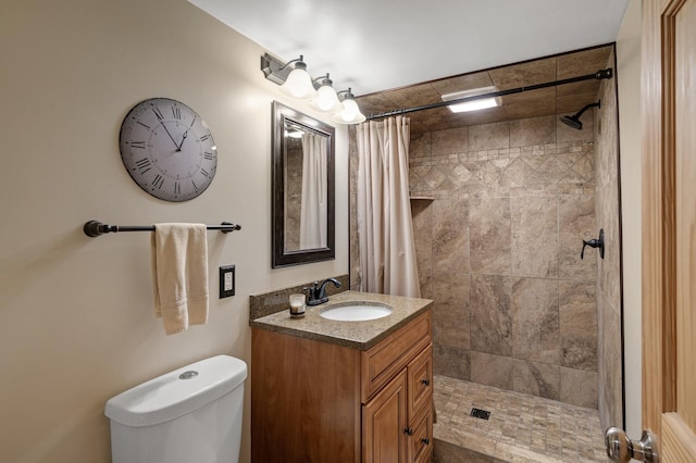 9452 Stevens Ave S, Bloomington, MN 55420 - bathroom with vanity, a tile shower, and toilet