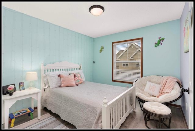 8065 Kirkwood Ln N Unit 82, Maple Grove, MN 55369 - bedroom with wood finished floors and baseboards