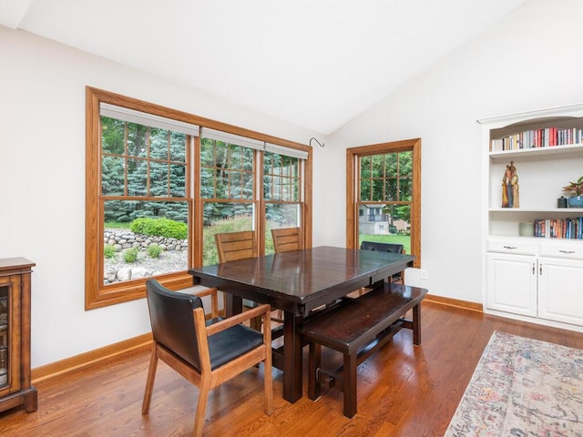 1776 Lockridge Ct, Waconia, MN 55387 - dining space featuring vaulted ceiling and dark wood finished floors