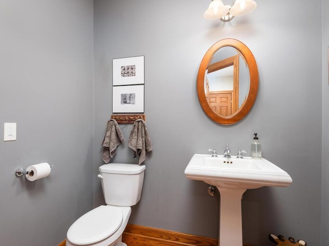 1776 Lockridge Ct, Waconia, MN 55387 - half bath featuring toilet and baseboards