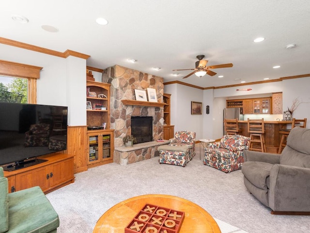 1776 Lockridge Ct, Waconia, MN 55387 - carpeted living room featuring crown molding, ceiling fan, recessed lighting, and a fireplace