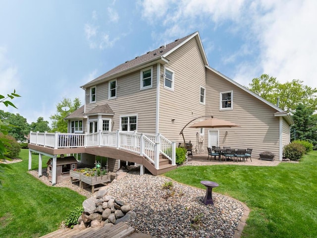 1776 Lockridge Ct, Waconia, MN 55387 - back of house with a wooden deck, a lawn, and a patio area