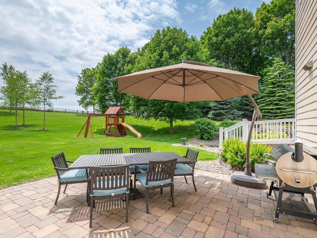 1776 Lockridge Ct, Waconia, MN 55387 - view of patio / terrace with outdoor dining space, a playground, and area for grilling