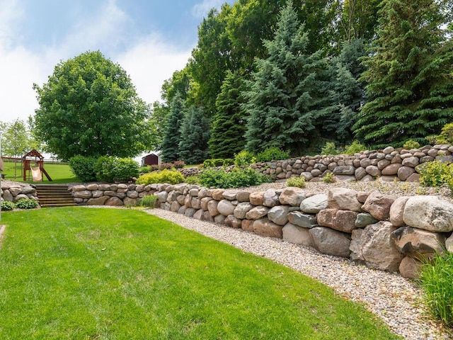 1776 Lockridge Ct, Waconia, MN 55387 - view of green lawn with a playground