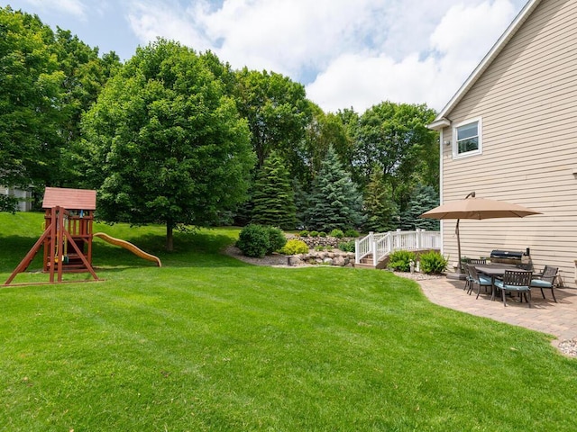1776 Lockridge Ct, Waconia, MN 55387 - view of green lawn featuring a patio area and a playground