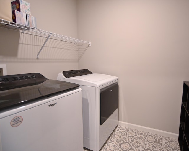 4837 Avery Ct, Eagan, MN 55123 - laundry room with washer and dryer and light tile patterned flooring