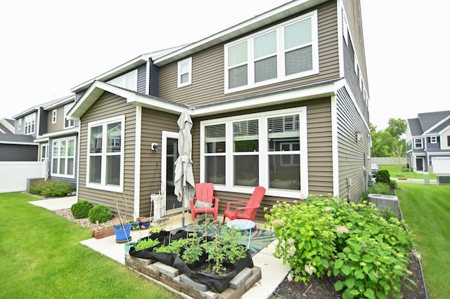 4837 Avery Ct, Eagan, MN 55123 - back of property featuring a lawn