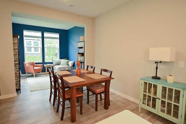 4837 Avery Ct, Eagan, MN 55123 - dining area featuring wood finished floors and baseboards