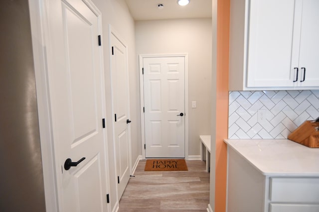4837 Avery Ct, Eagan, MN 55123 - hallway with light wood-style floors and recessed lighting