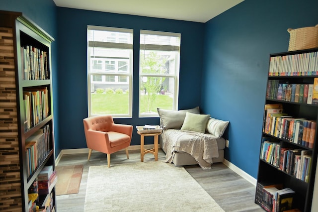 4837 Avery Ct, Eagan, MN 55123 - sitting room with wood finished floors and baseboards