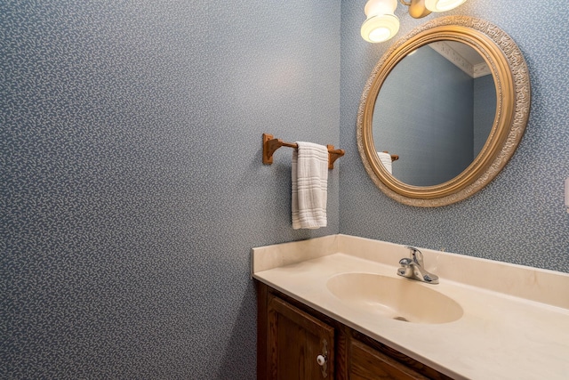 957 Belvista Dr, North Mankato, MN 56003 - bathroom with vanity and wallpapered walls