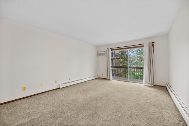 2800 Hillsboro Ave N Unit 214, New Hope, MN 55427 - carpeted empty room featuring a baseboard radiator and a wall unit AC