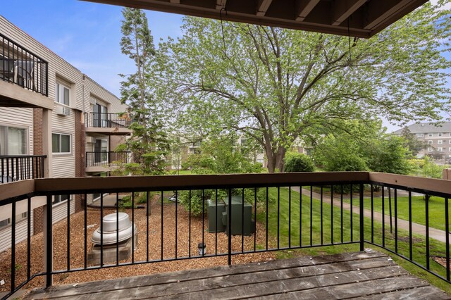 2800 Hillsboro Ave N Unit 214, New Hope, MN 55427 - wooden deck with a residential view and a lawn