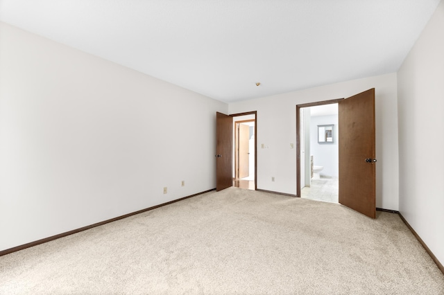2800 Hillsboro Ave N Unit 214, New Hope, MN 55427 - unfurnished bedroom with light colored carpet and ensuite bathroom