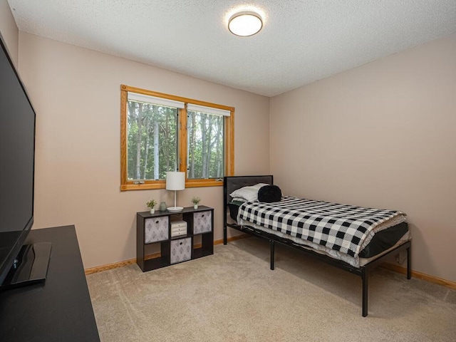 5956 Norway Pine Ct, White Bear Twp, MN 55110 - bedroom featuring carpet flooring, baseboards, and a textured ceiling
