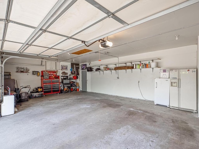 5956 Norway Pine Ct, White Bear Twp, MN 55110 - garage with white refrigerator with ice dispenser and a garage door opener