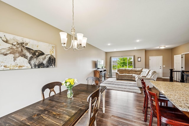 12083 79th St NE, Otsego, MN 55330 - dining area featuring dark wood-style floors, recessed lighting, and a chandelier
