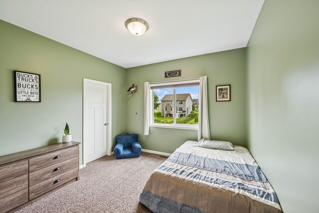12083 79th St NE, Otsego, MN 55330 - bedroom featuring carpet flooring and baseboards