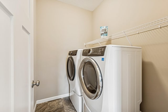 12083 79th St NE, Otsego, MN 55330 - laundry area with independent washer and dryer and baseboards