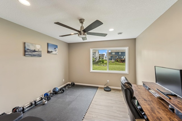 12083 79th St NE, Otsego, MN 55330 - unfurnished office featuring ceiling fan, baseboards, a textured ceiling, wood finished floors, and recessed lighting