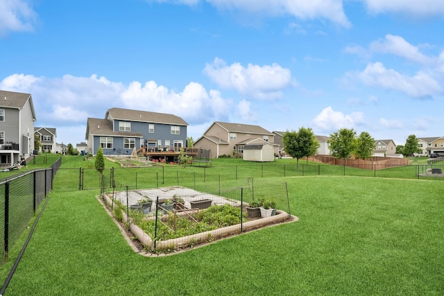 12083 79th St NE, Otsego, MN 55330 - view of yard with a residential view, a deck, and a garden