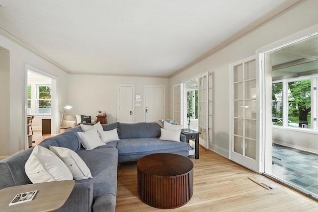2516 Humboldt Ave S, Minneapolis, MN 55405 - living room featuring light wood-type flooring and ornamental molding