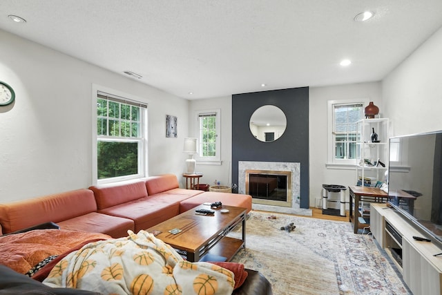 2516 Humboldt Ave S, Minneapolis, MN 55405 - living area with a fireplace, wood finished floors, and recessed lighting